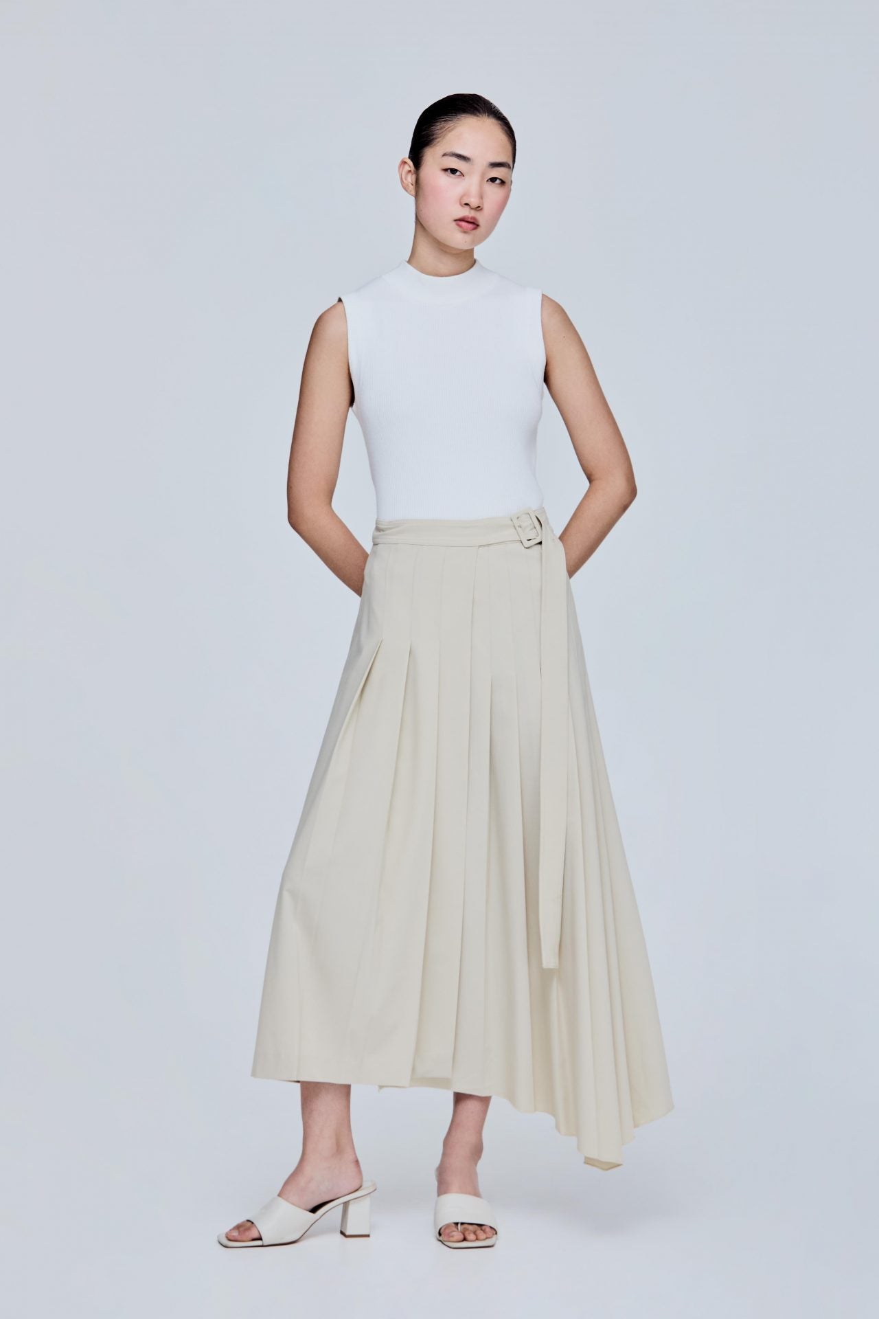 Asymmetrical Pleated Skirt – SANS & SANS Singapore